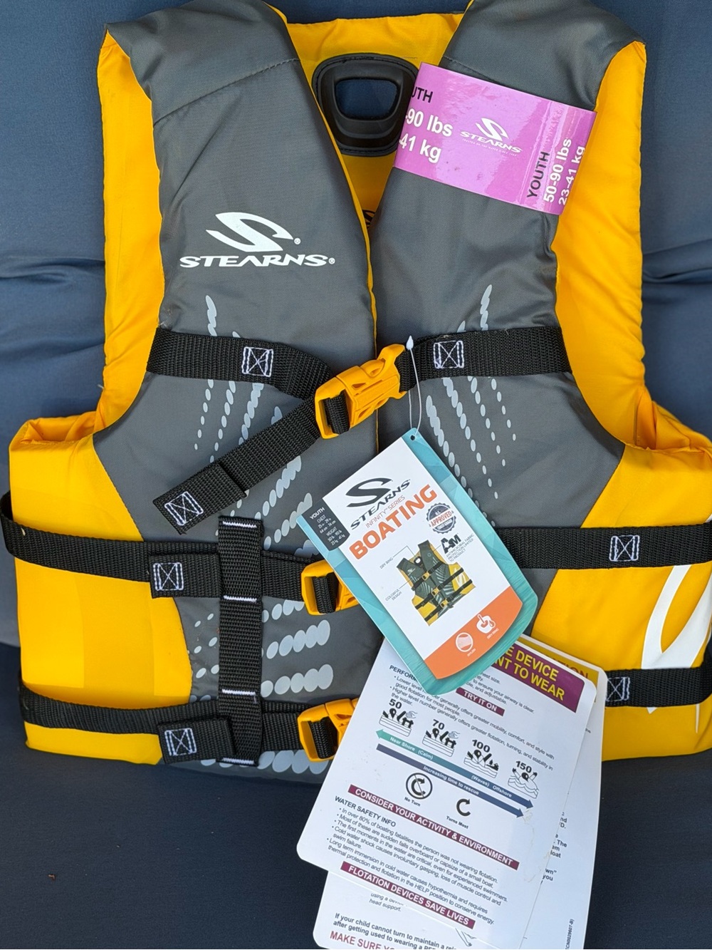 Stearns USCG approved Youth life vest NWT 3 buckle. Boating, swimming, tubing